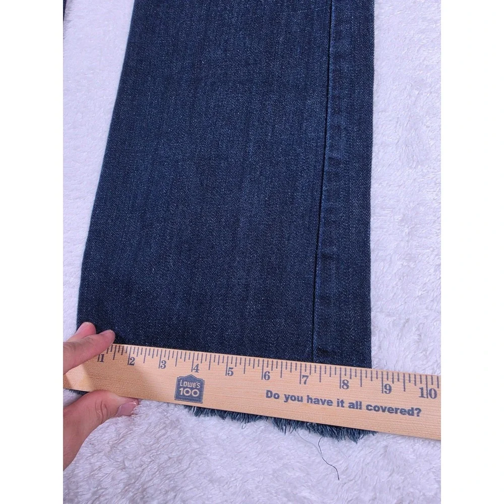 Levi's 527 Slim Bootcut Mens 31/32 Dark Blue Denim Raw Hem Jeans S110760